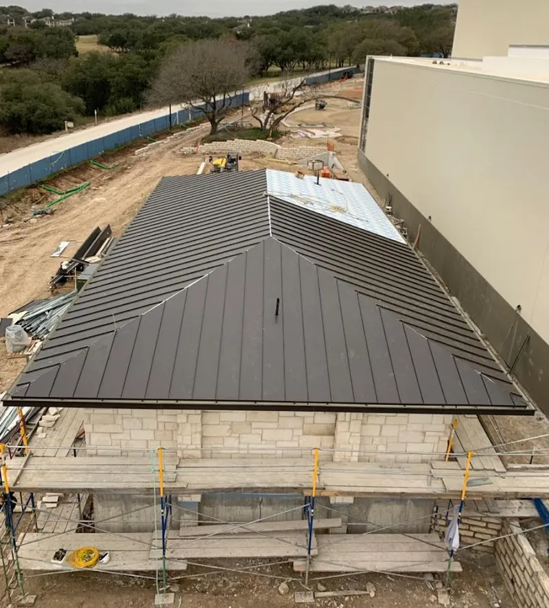 Metal roof new construction with scaffolding in Springfield