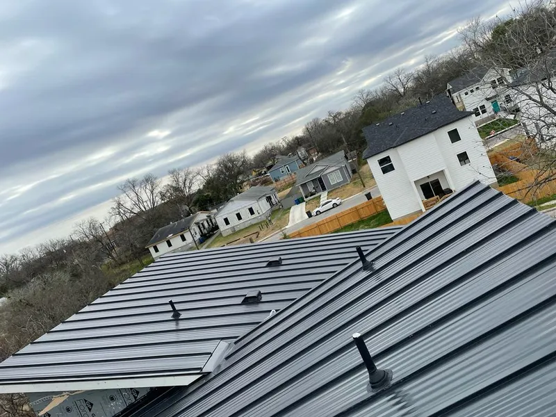 Standing seam metal roof panels with vents for Skylight Repair in Springfield